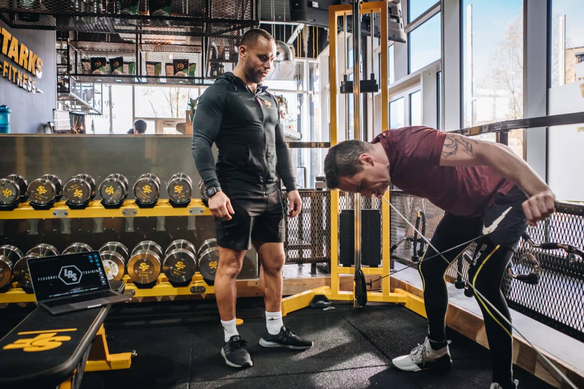 Lucas observing client with flys and laptop