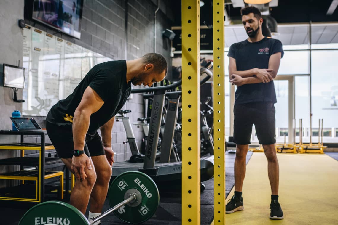 Lucas demonstrating knee angle for a dead lift