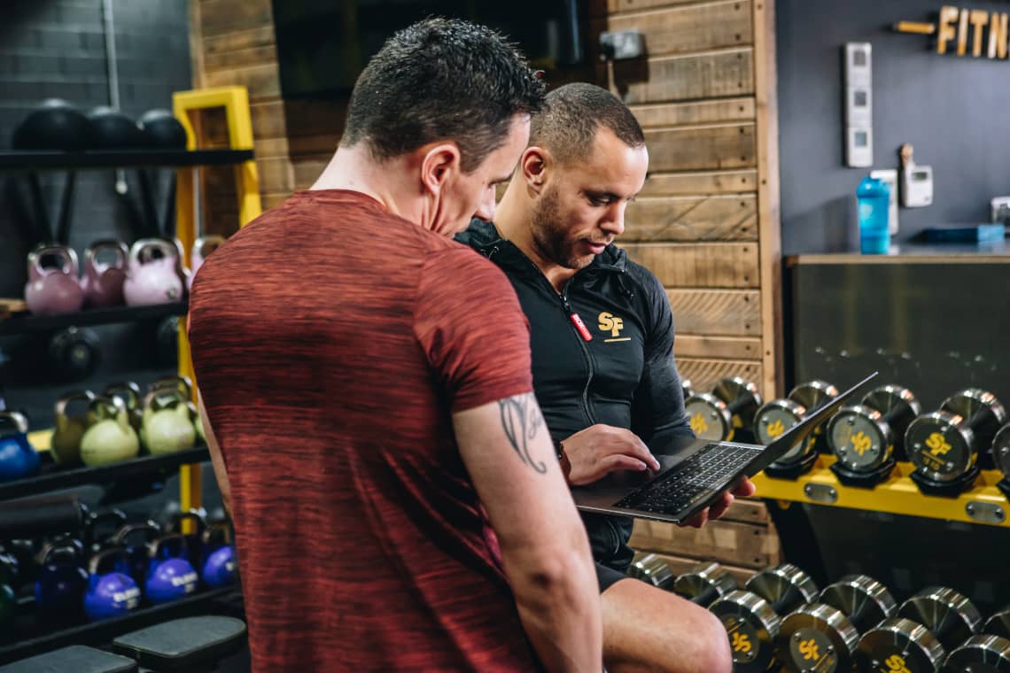 Lucas running laptop analysis with client